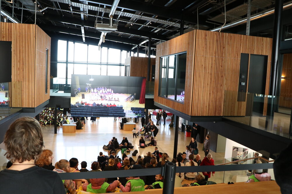 Participants watch Waiata Powhiri