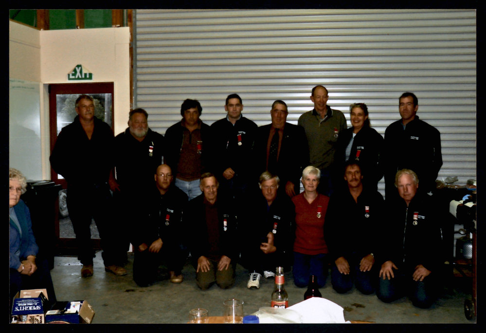 Papatowai Fire Brigade Members with Councillor Kevin Thompson