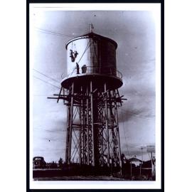 Man belaying from Water Tower 