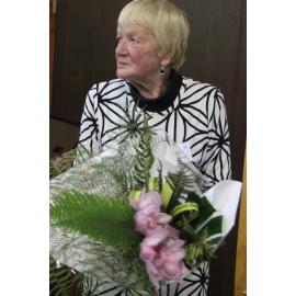 Gaye Homer receives flowers Lions 50th